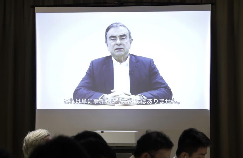 A video of Carlos Ghosn, former chairman of Nissan Motor Co., is projected on a screen during a news conference at the Foreign Correspondents' Club of Japan (FCCJ) in Tokyo, Japan, on Tuesday, April 9, 2019. Ghosn, speaking in a video message recorded before he was arrested last week, blamed Nissan's executives for "playing a dirty game" by orchestrating his arrest and incarceration instead of working to fix the automaker's deteriorating performance. Photographer: Kiyoshi Ota/Bloomberg