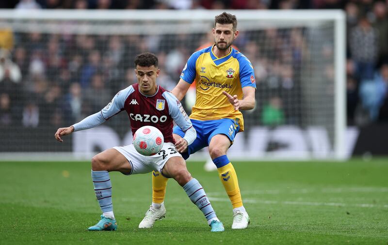 Villa's Philippe Coutinho under pressure from Jack Stephens of Southampton. Getty