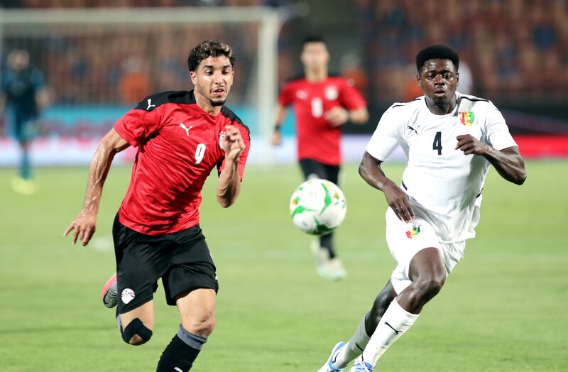 Omar Marmoush (L) of Egypt in action against Saidou Sow (R) of Guinea during the Africa Cup of Nations (AFCON) qualifying soccer match between Egypt and Guinea in Cairo, Egypt. EPA