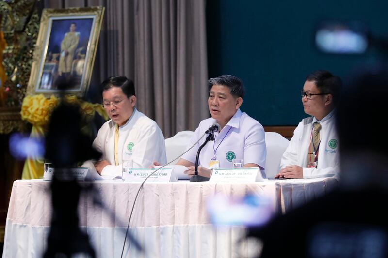 Jesada Chokdumrongsuk, center, deputy director general of the Public Health Ministry, speaks during a press conference at a hospital in Chiang Rai province. AP Photo