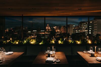 The restaurant offers views of the lit-up dome of Harrods. Photo: Clap London