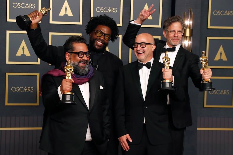Left to right, Joseph Patel, Ahmir 'Questlove' Thompson, David Dinerstein, and Robert Fyvolent pose with their Oscar for Best Documentary Feature for 'Summer of Soul (. . . Or, When the Revolution Could Not Be Televised),' in the press room during the 94th annual Academy Awards. EPA