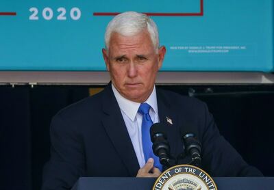 (FILES) In this file photo US Vice President Mike Pence speaks at a Latinos For Trump rally in Orlando, Florida on October 10, 2020.   US Vice President Mike Pence is opposed to using the constitution's 25th Amendment to force President Donald Trump from office, despite pressure from democrats and some Republicans, the New York Times reported on January 7, 2021. While Pence has not spoken publicly about invoking the mechanism, never used before in US history, the newspaper cited a person close to the vice president saying he is against the radical move. / AFP / Zak BENNETT
