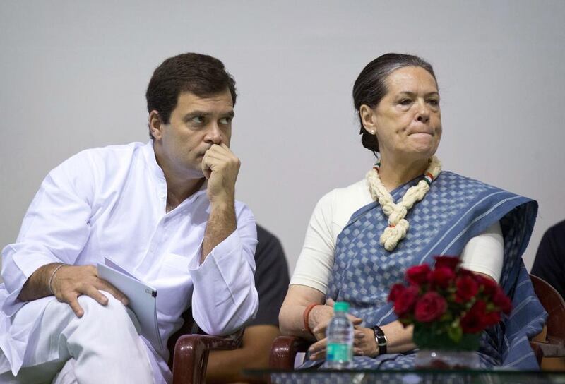 Congress party president Sonia Gandhi, right, and her son and party vice president Rahul Gandhi listen to a speaker during celebrations marking the 125th birth anniversary of Jawaharlal Nehru, India’s first prime minister and the father Mrs Gandhi’s late husband, in New Delhi on November 13, 2014. Saurabh Das / AP Photo