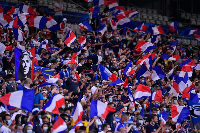 Fans inside the Stade de France cheer on the France team. Getty Images