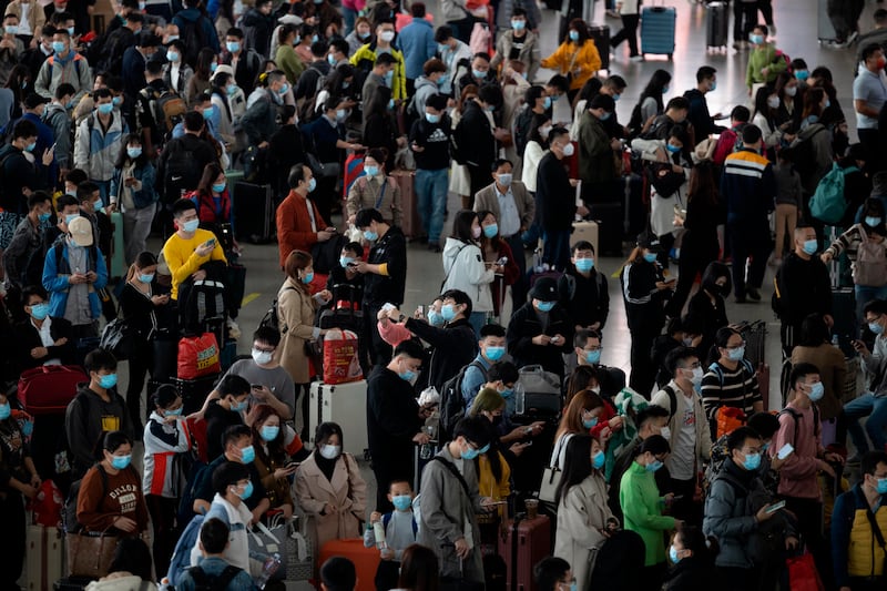 Chinese are heading home for the Lunar New Year despite a government plea to avoid travelling. AP