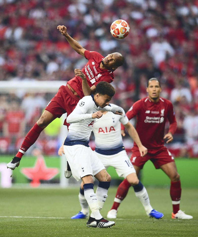 MADRID, SPAIN - JUNE 01: Fabinho of Liverpool and Dele Alli of Tottenham Hotspur compete for the ball during the UEFA Champions League Final between Tottenham Hotspur and Liverpool at Estadio Wanda Metropolitano on June 01, 2019 in Madrid, Spain. (Photo by Matthias Hangst/Getty Images)