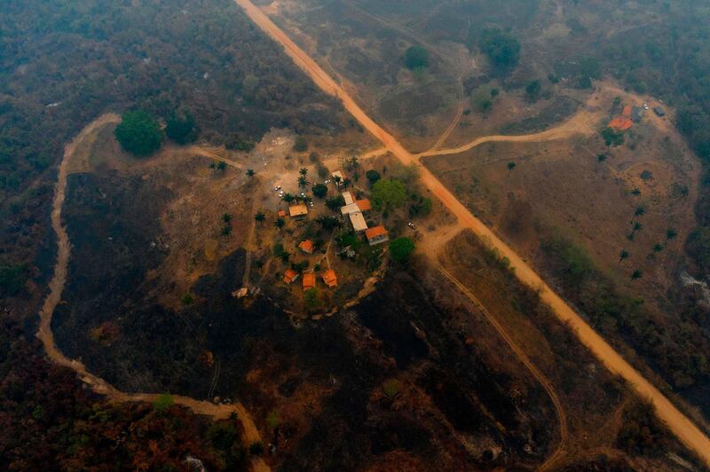 Aerial view showing the Jaguar Ecological Reserve Lodge, surrounded by burnt vegetation in the Pantanal, the world's largest tropical wetland. AFP