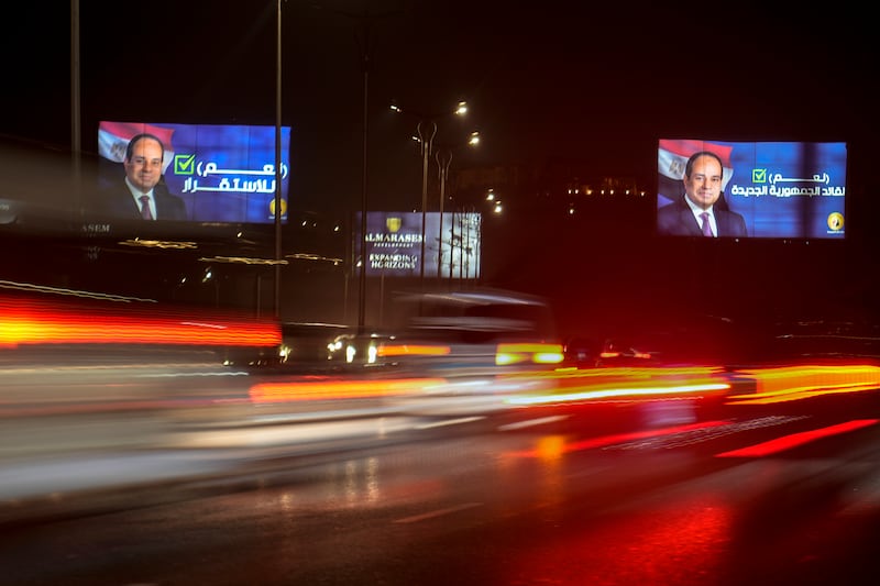 Billboards in Cairo supporting President Abdel Fattah El Sisi in the run-up to December's presidential elections. AP