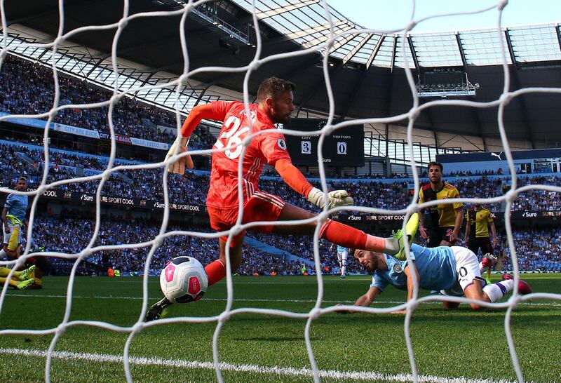 MANCHESTER, ENGLAND - SEPTEMBER 21:  Bernardo Silva of Manchester City scores his team's fourth goal past Ben Foster of Watford FC during the Premier League match between Manchester City and Watford FC at Etihad Stadium on September 21, 2019 in Manchester, United Kingdom. (Photo by Alex Livesey/Getty Images)