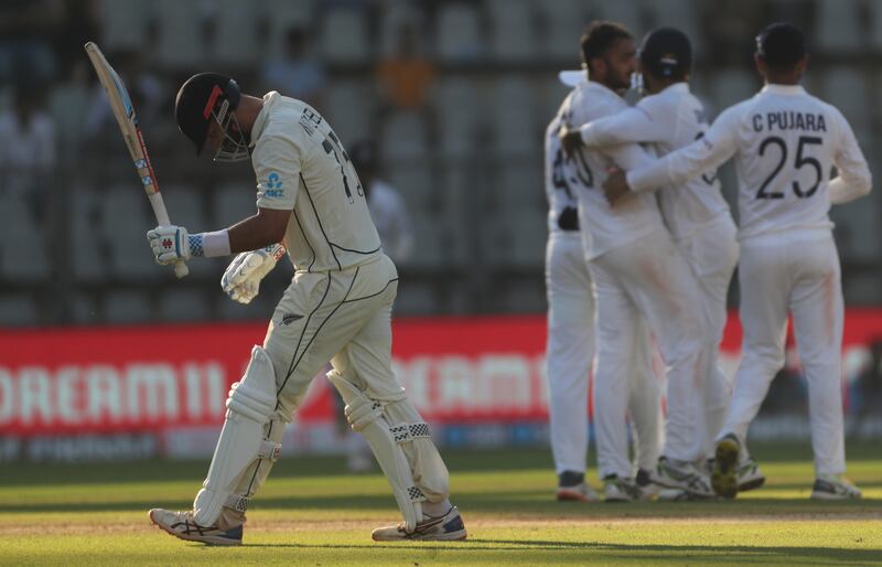 India celebrate after taking the wicket of New Zealand batsman Daryl Mitchell during Day 3 of the second Test at the Wankhede Stadium in Mumbai on Sunday, December 5. AP