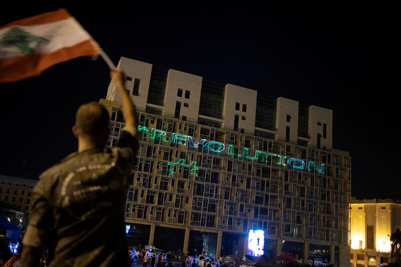 The word "Revolution" is projected on a building during an anti-government protest in downtown Beirut, Lebanon October 22, 2019. REUTERS/Alkis Konstantinidis