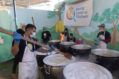 Members of World Central Kitchen prepare food for Palestinians in Gaza. Reuters