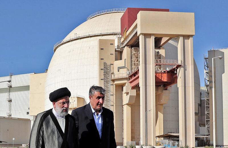 Iran's President Ebrahim Raisi, left, and chief of the Atomic Energy Organisation of Iran Mohammad Eslami on a visit to the Bushehr Nuclear Power Plant. AFP
