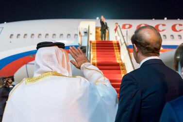 Sheikh Mohamed bin Zayed waves goodbye to Russian President Vladimir Putin in Abu Dhabi. 