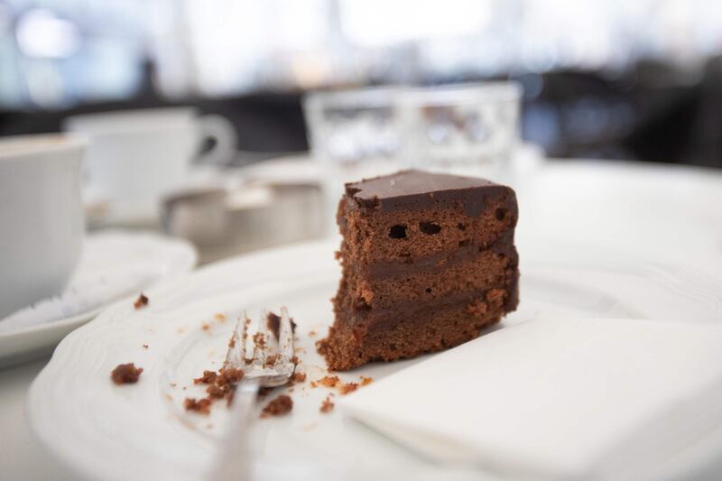 An unfinished piece of cake is seen on a table of a cafe near Stephansplatz in Vienna after terrorist shootings at several locations across central Vienna.  AFP