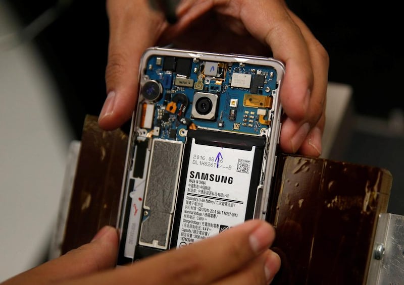 A Samsung Note 7 is positioned for tests. Edgar Su / Reuters