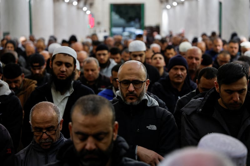 Palestinians pray inside Al Aqsa Mosque compound. Reuters