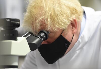 Boris Johnson during a visit to a laboratory at The National Institute for Biological Standards. Getty Images