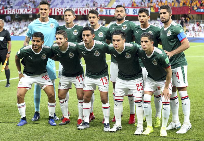 Al Ain, United Arab Emirates - December 18, 2018: The Guadalajara team before the game between Espérance de Tunis and Guadalajara in the Fifa Club World Cup. Tuesday the 18th of December 2018 at the Hazza Bin Zayed Stadium, Al Ain. Chris Whiteoak / The National