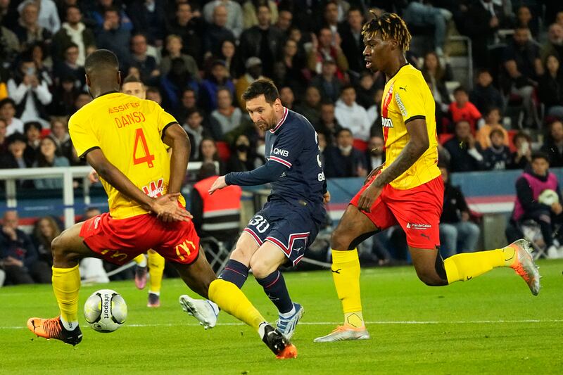 Lionel Messi takes a shot on goal during PSG's Ligue 1 match against Lens. AP