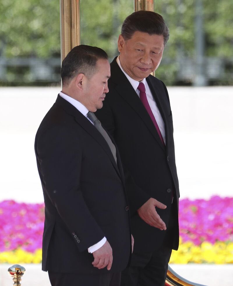 Mongolian President Khaltmaagiin Battulga and Chinese President Xi Jinping attend the welcome ceremony at the Great Hall of People in Beijing, China. Getty Images