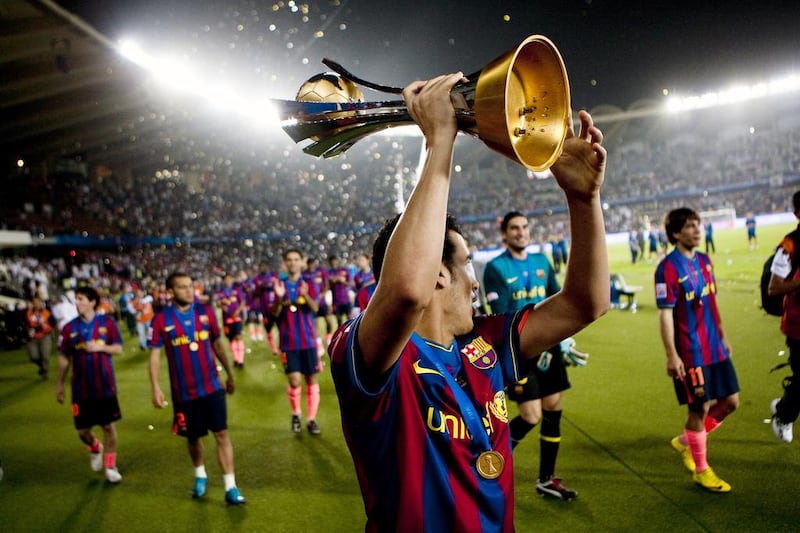 Barcelona receive their winners’ trophy after the final of the FIFA Club World Cup at Zayed Sports City on December 19, 2009. Andrew Henderson / The National
