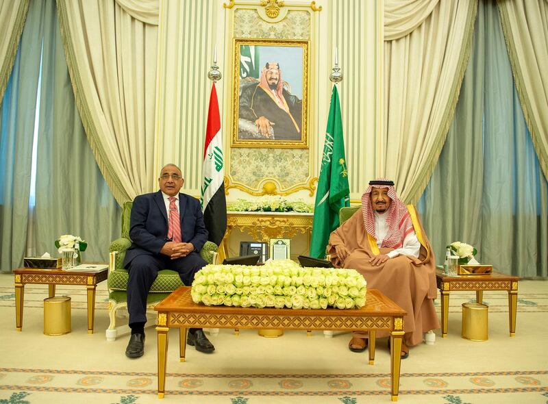 A handout photo made available by the Saudi Royal Palace shows Saudi King Salman bin Abdulaziz meeting with Iraq's Prime Minister Adel Abdul Mahdi in Riyadh. EPA