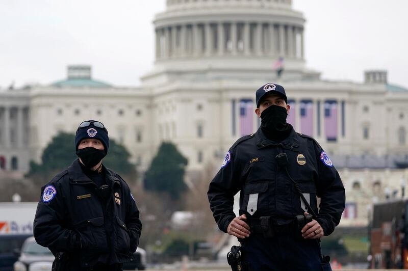 Capitol Police guard the U.S. Capitol in Washington, Friday, Jan. 15, 2021, ahead of the inauguration of President-elect Joe Biden and Vice President-elect Kamala Harris. (AP Photo/Susan Walsh)