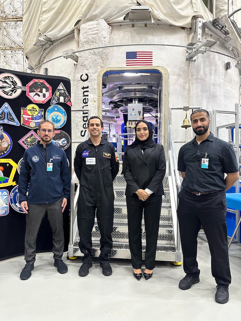 Emirati pilot Shareef Al Romaithi, second left, with colleagues from the Mohammed bin Rashid Space Centre after exiting the Hera habitat in Houston, Texas, following a 45-day Mars simulation mission. Photo: MBRSC