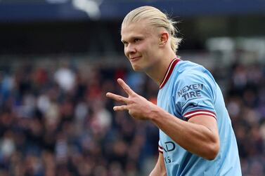 Soccer Football - Premier League - Manchester City v Manchester United - Etihad Stadium, Manchester, Britain - October 2, 2022 Manchester City's Erling Braut Haaland celebrates scoring their fifth goal and completing his hat-trick REUTERS/Phil Noble EDITORIAL USE ONLY.  No use with unauthorized audio, video, data, fixture lists, club/league logos or 'live' services.  Online in-match use limited to 75 images, no video emulation.  No use in betting, games or single club /league/player publications.   Please contact your account representative for further details.      TPX IMAGES OF THE DAY