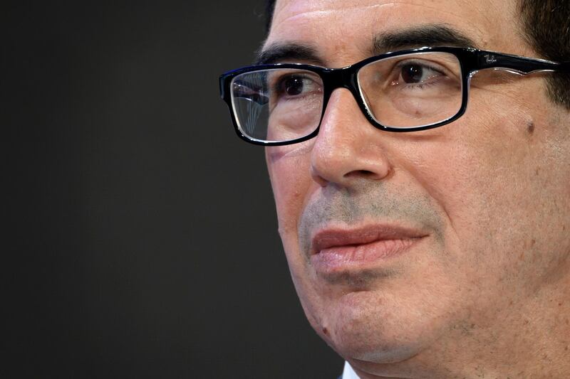(FILES) In this file photo taken on January 21, 2020 US Treasury Secretary Steven Mnuchin attends a session at the Congres center during the World Economic Forum (WEF) annual meeting in Davos, on January 21, 2020.

 Mnuchin on January 23, 2020, pledged a new round of tax cuts that he said would benefit ordinary Americans. "The president has asked us to start working on what we call tax 2.0," Mnuchin said told CNBC from the global economic forum Davos, Switzerland. / AFP / Fabrice COFFRINI
