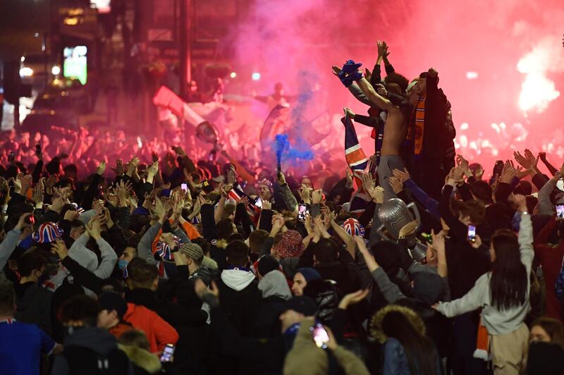 Rangers fans gather in George Square in Glasgow to celebrate the club winning the Scottish Premiership for the first time in 10 years. Getty