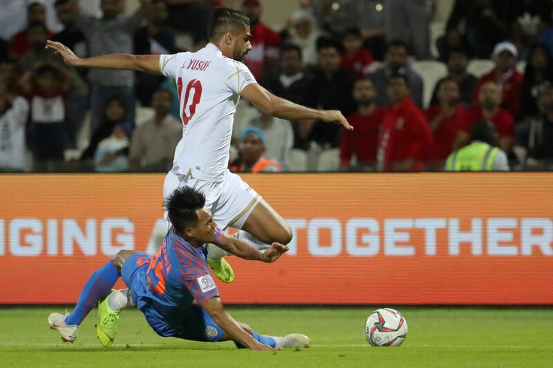 India's Udanta Singh fights for the ball with Bahrain's forward Abdulla Yusuf Helal. AFP