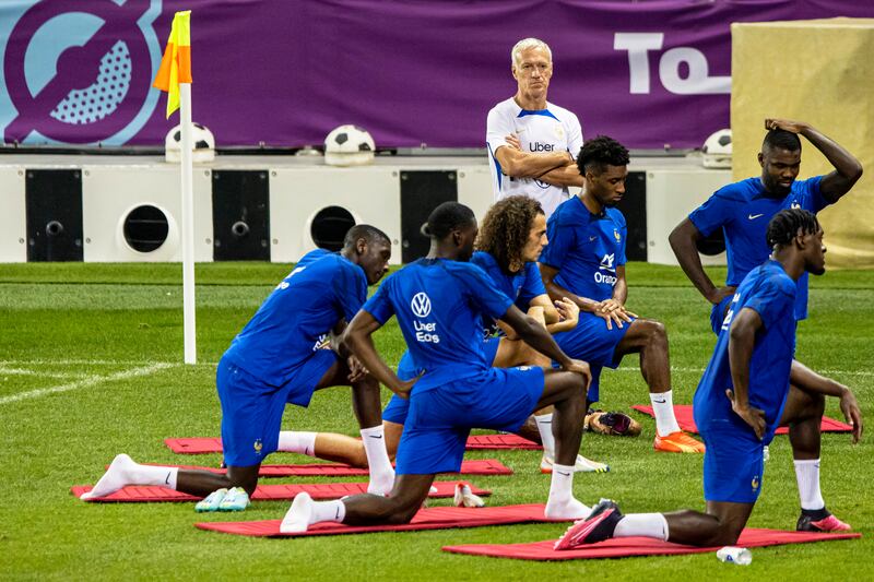 France coach Didier Deschamps oversees training in Doha. EPA