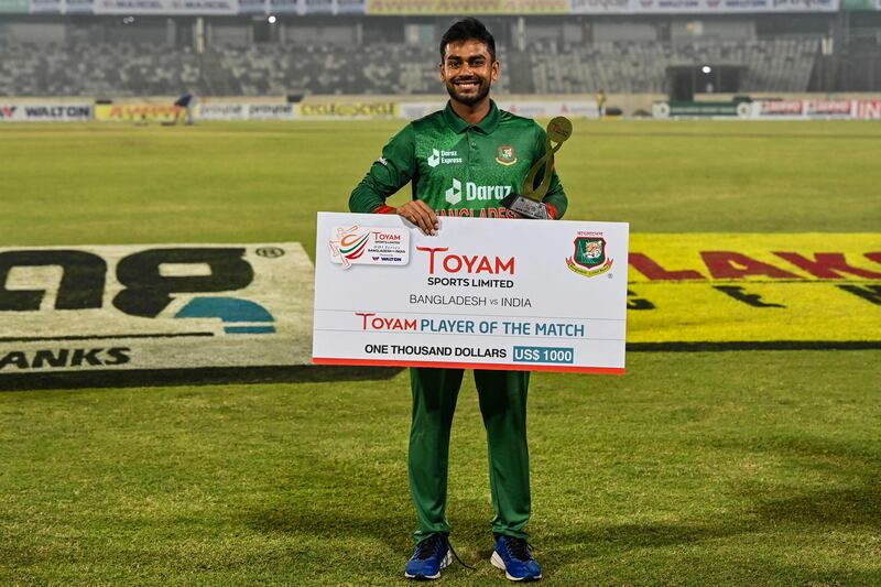 Bangladesh's Mehidy Hasan Miraz with his man of the match award. AFP
