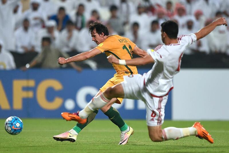 Robbie Kruse of Australia attempts a shot at the UAE goal. Tom Dulat / Getty Images