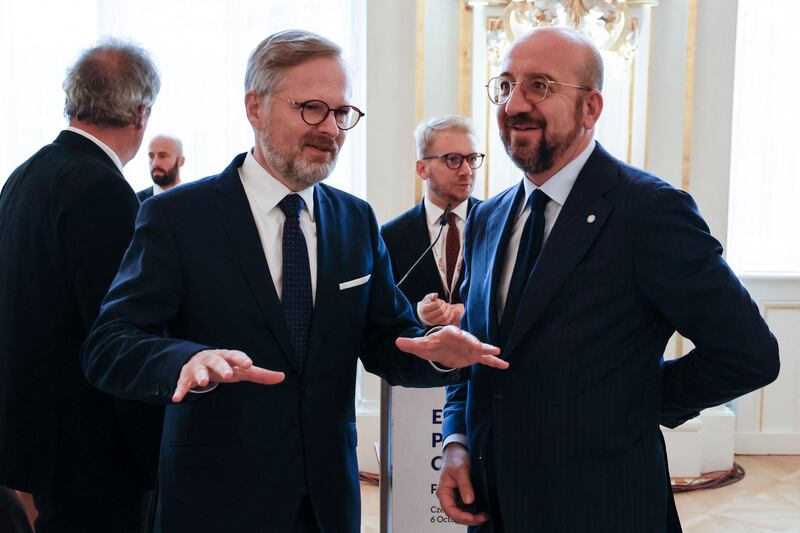 Czech Prime Minister Petr Fiala speaks to President of the European Council Charles Michel. AFP