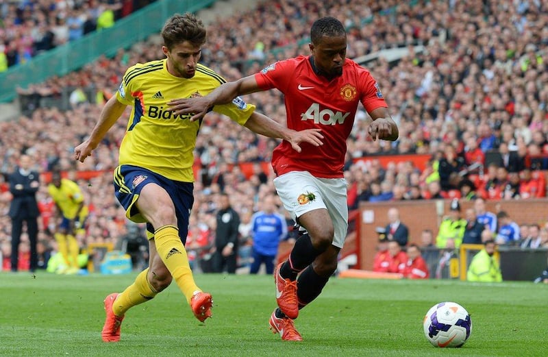 Patrice Evra has appeared in 32 Premier League matches for Manchester United this season. Andrew Yates / AFP 