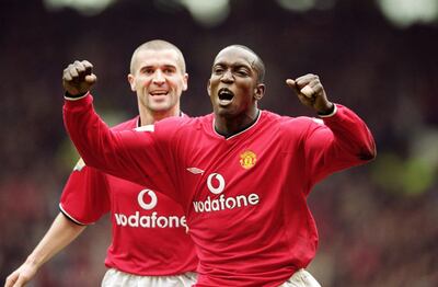 14 Apr 2001:  Manchester United goal scorer Dwight Yorke is congratulated by team mate Roy Keane during the FA Carling Premiership match against Coventry City at Old Trafford in Manchester, England. United won 4-2. \ Mandatory Credit: Clive Brunskill /Allsport / Getty Images