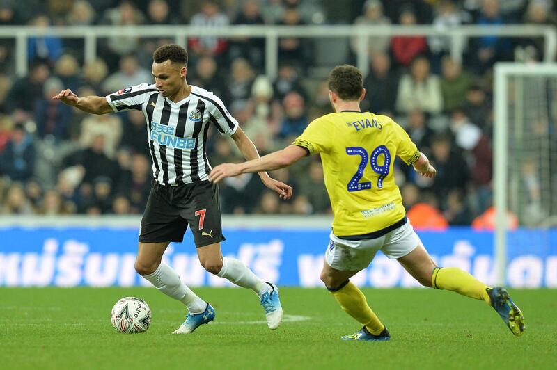 NEWCASTLE UPON TYNE, ENGLAND - JANUARY 05:  Jacob Murphy of Newcastle United battles for possession with Corry Evans of Blackburn Rovers during the FA Cup Third Round match between Newcastle United and Blackburn Rovers at St. James Park on January 5, 2019 in Newcastle upon Tyne, United Kingdom.  (Photo by Mark Runnacles/Getty Images)