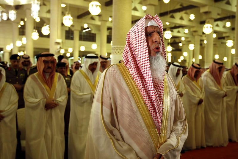 Saudi Arabia's Grand Mufti Sheikh Abdul Aziz bin Abdullah Al Sheikh prays at the Imam Turki bin Abdullah mosque in Riyadh during Eid Al Fitr morning prayers on September 9, 2010. Hassan Ammar / AP