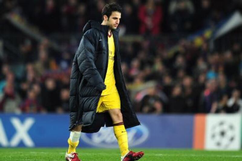 BARCELONA, SPAIN - MARCH 08:  Cesc Fabregas of Arsenal leaves the field at the end of the UEFA Champions League round of 16 second leg match between Barcelona and Arsenal at the Nou Camp Stadium on March 8, 2011 in Barcelona, Spain.  (Photo by Shaun Botterill/Getty Images) *** Local Caption ***  GYI0063860453.jpg