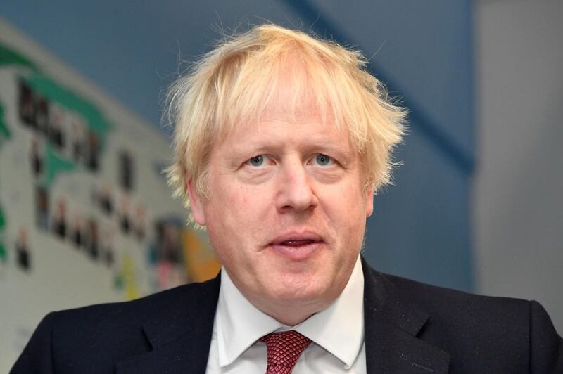 Britain's Prime Minister Boris Johnson visits Pimlico Primary school in London on September 10, 2019.  / AFP / POOL / TOBY MELVILLE
