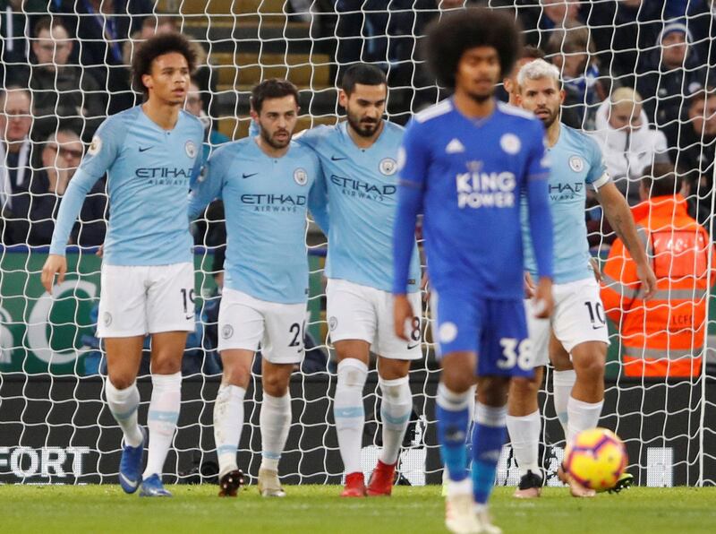 Silva celebrates scoring their only goal with Sane and teammates. Action Images via Reuters
