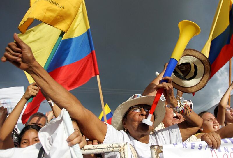 People attend an election campaign of Leftist Presidential candidate Gustavo Petro in Cali, Colombia. Ernesto Guzman / EPA