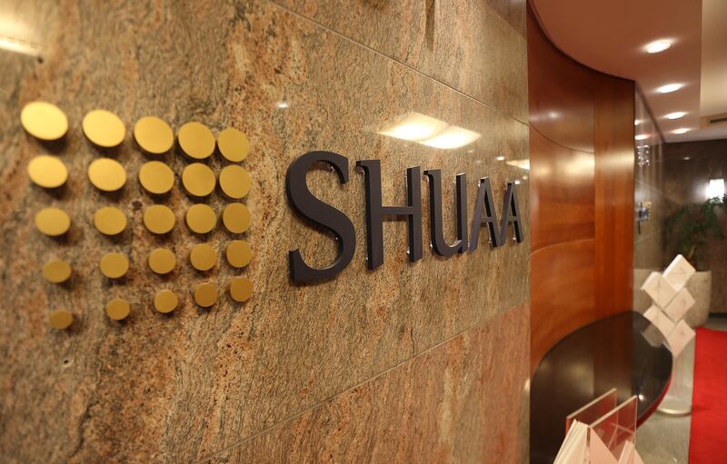 DUBAI , UNITED ARAB EMIRATES Ð Nov 13 , 2014 : Signage of the Shuaa Capital in Emirates Tower Offices in Dubai. ( Pawan Singh / The National ) For Business. Story by Sananda Sahoo
