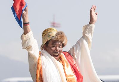 epa07599026 Nepalese veteran mountaineer Kami Rita Sherpa gestures after arriving at Kathmandu Airport in Kathmandu, Nepal, 25 May 2019. Kami Rita, a professional mountaineer guide has successfully climbed Mount Everest 24 times setting a new world record for climbing Mount Everest.  EPA/NARENDRA SHRESTHA