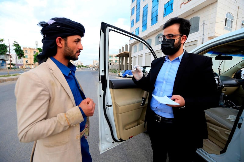 Yemeni physician Sami Yahya Al Hajj provides free medical service from his car in the capital Sanaa. AFP