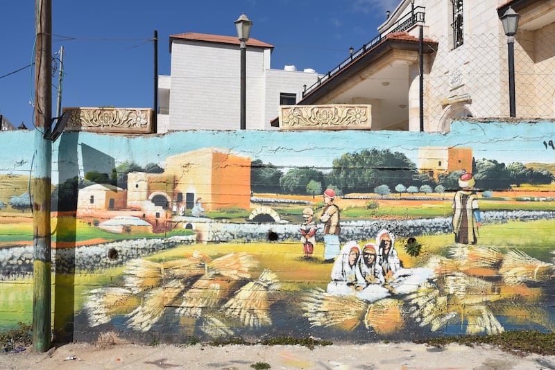 A mural depicting the West Bank village of Beitin in the 1920s. 